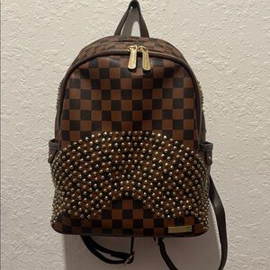 Sprayground Brown Checkered Backpack with Gold Accents